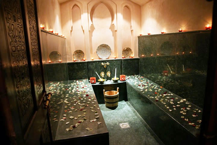 traditional Moroccan hammam ritual using black soap for skin exfoliation